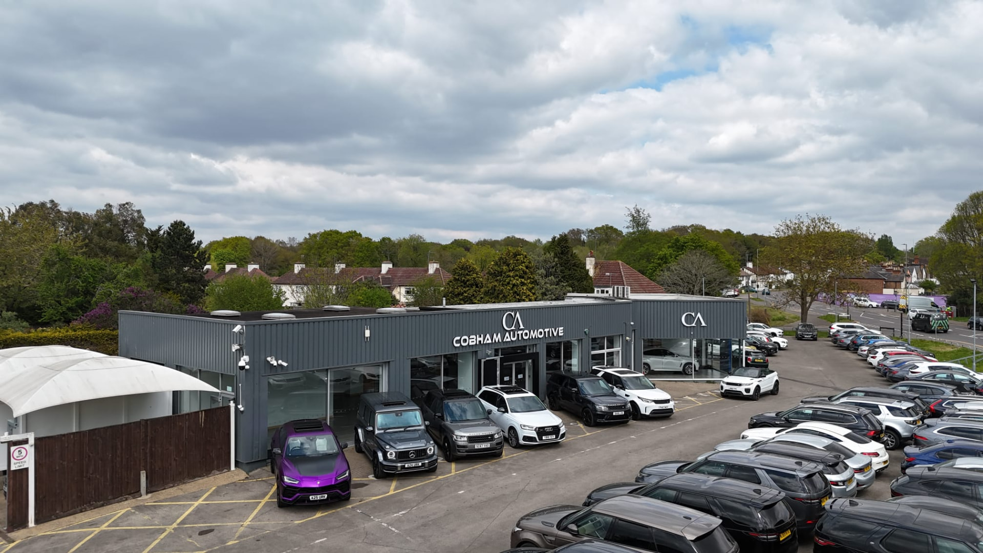 The Cobham Automotive showroom building and signage from above