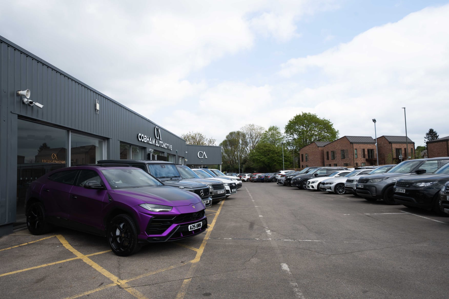 Cars lined up on the Cobham Automotive forecourt